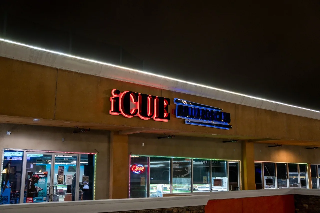 iCUE Billiard Club storefront sign and entrance at night in Rowland Heights
